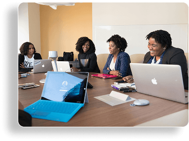 Business meeting with professionals around conference table